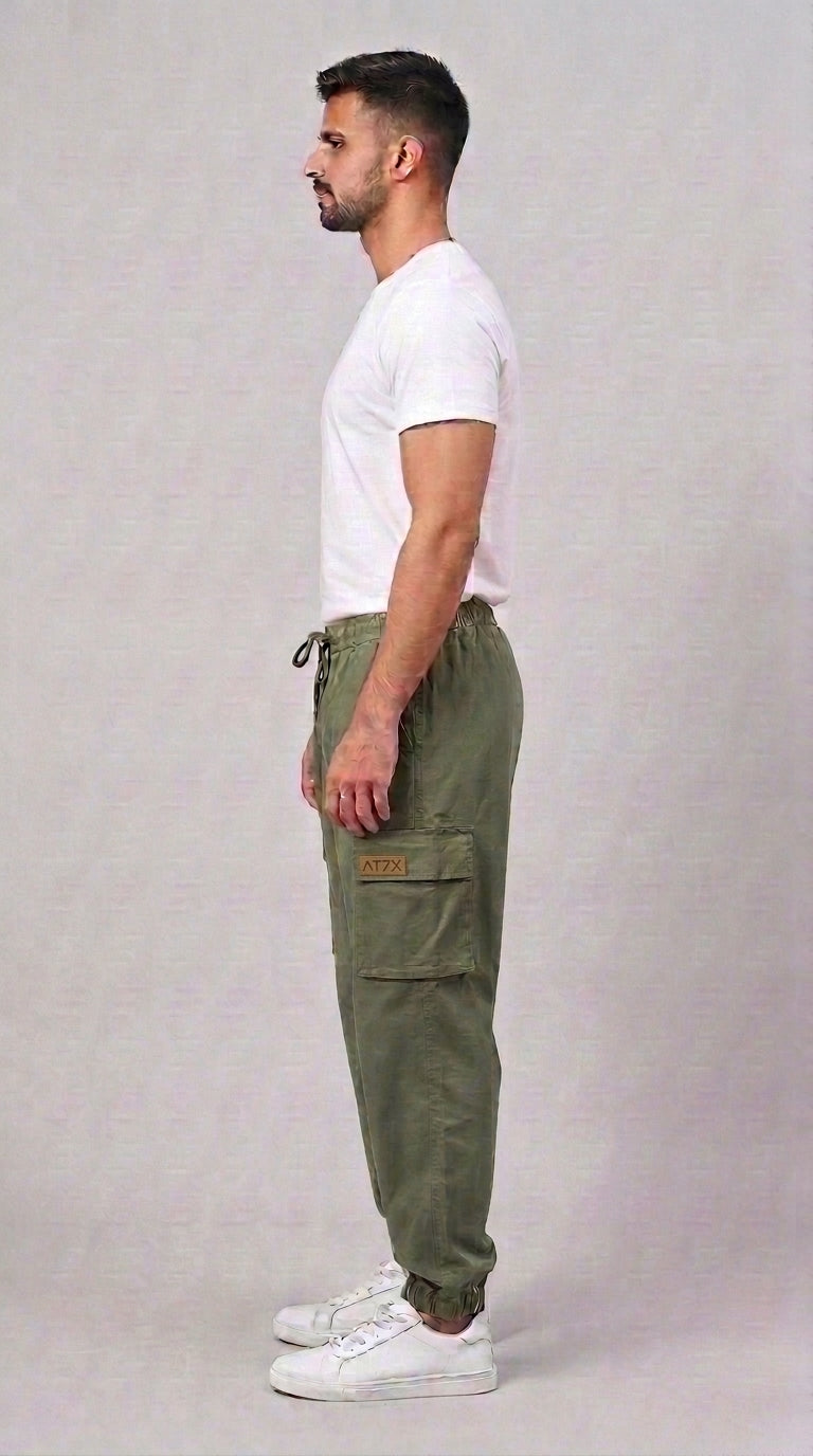 AT7X Classic Olive Green 5 pocket loose fit jogger trouser for men, side view showing flat cargo pocket