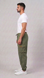 AT7X Classic Olive Green 5 pocket loose fit jogger trouser for men, side view showing flat cargo pocket