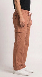 AT7X earthy warm loose fit cargo trouser for men, side view showing cargo pocket