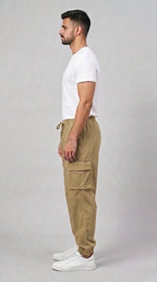 AT7X Khaki Beige 5 pocket loose fit jogger trouser for men, side view showing flat cargo pocket