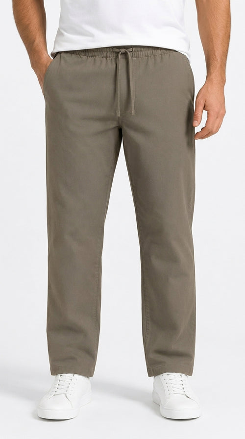 AT7X stone grey slim fit plain trouser for men, front view, Pakistan